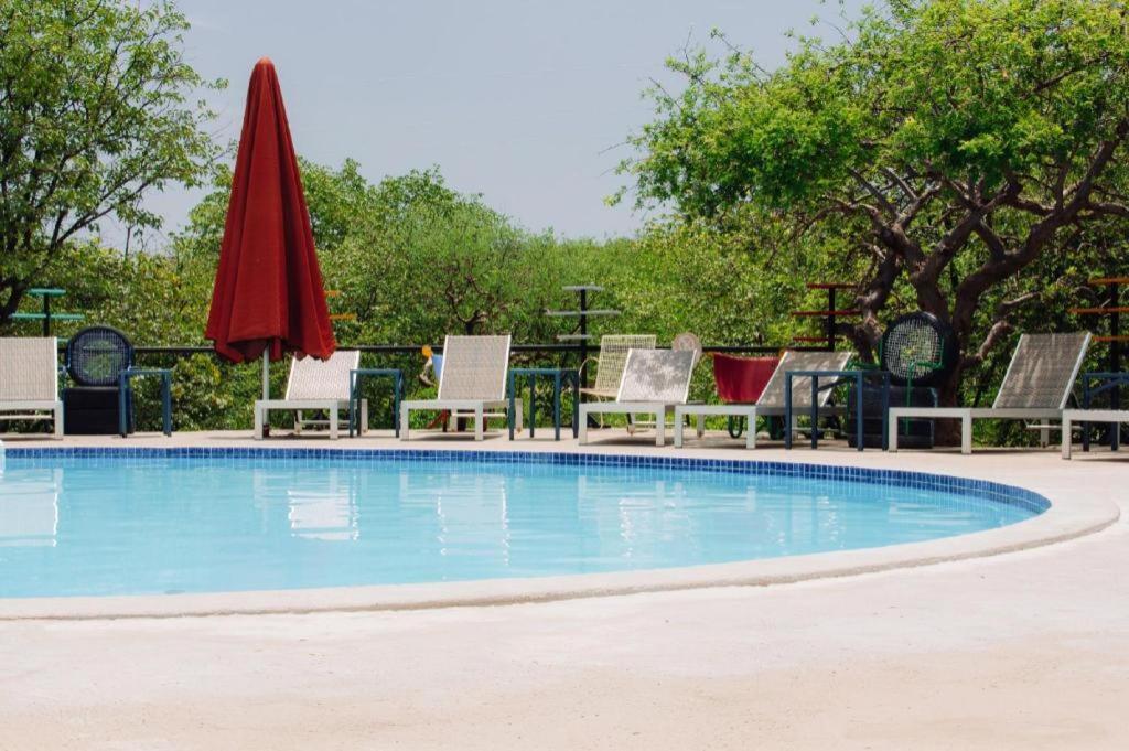 Etosha Safari Camp, Etosha National Park, Namibia Hotel Okaukuejo Kültér fotó